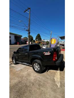 TOYOTA - HILUX - 2009/2010 - Preta - R$ 110.000,00